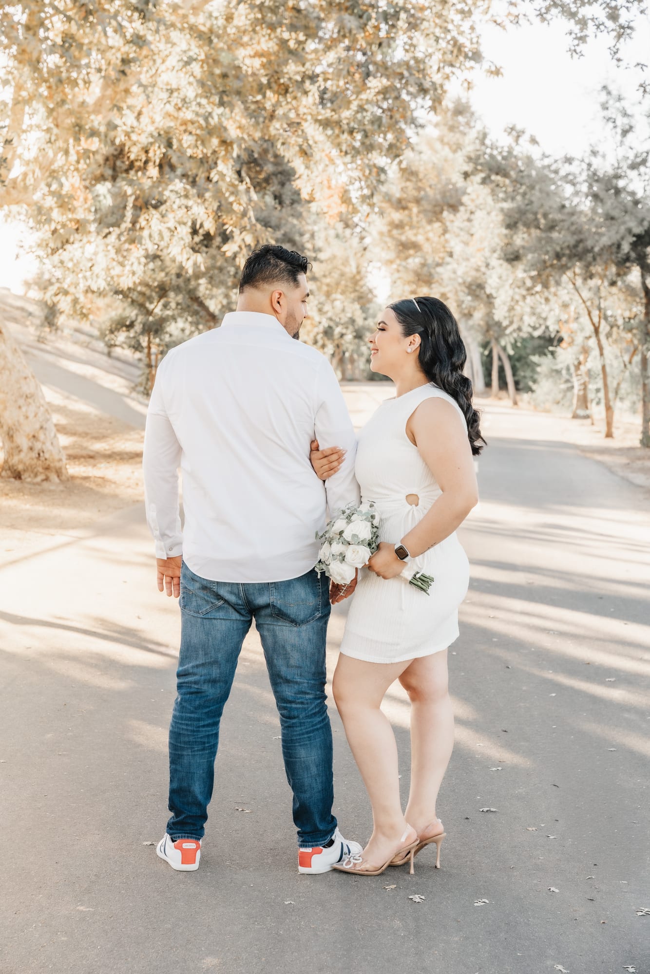 Couple walking together after their portrait session