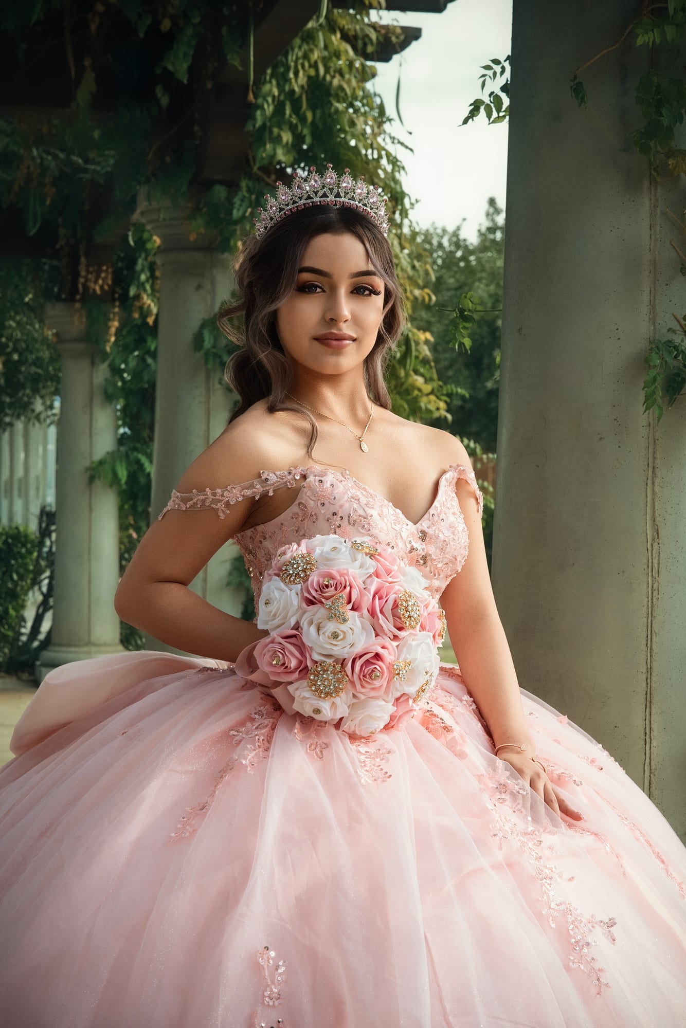 Quinceañera in a blue dress photographed outdoors